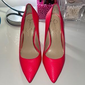 Neon pink snake skin heels